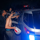 Protestors slap and kick a car transporting David Duke after a U.S. senate debate at Dillard University in New Orleans, Louisiana on Nov. 2. (Image via AP Photo/Gerald Herbert)